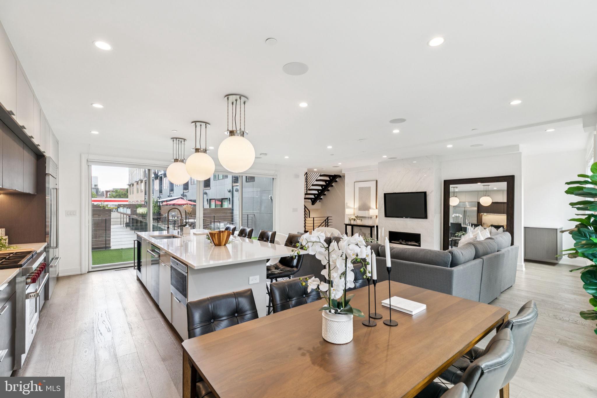 618 South Clarion Street Philadelphia, PA 19147 - Photo 7 of 65 a view of a dining room with furniture and wooden floor