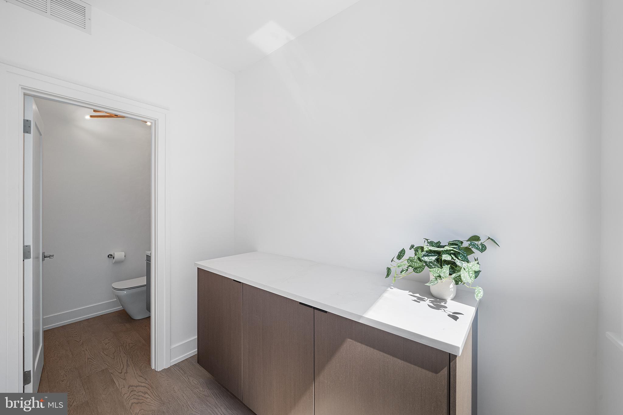 618 South Clarion Street Philadelphia, PA 19147 - Photo 9 of 65 a room with a sink and a toilet