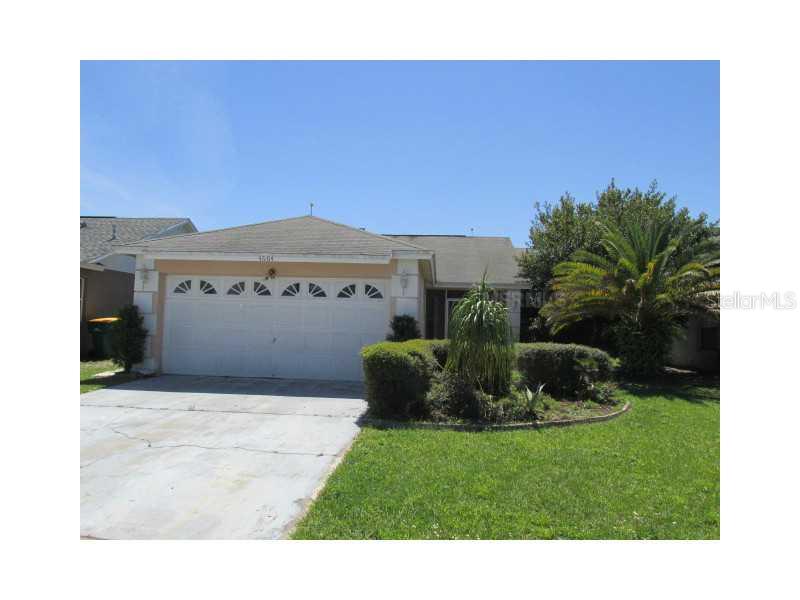 4604 Cheyenne Point Trail Kissimmee, FL 34746 - Photo 1 of 1 a view of a house with a garden