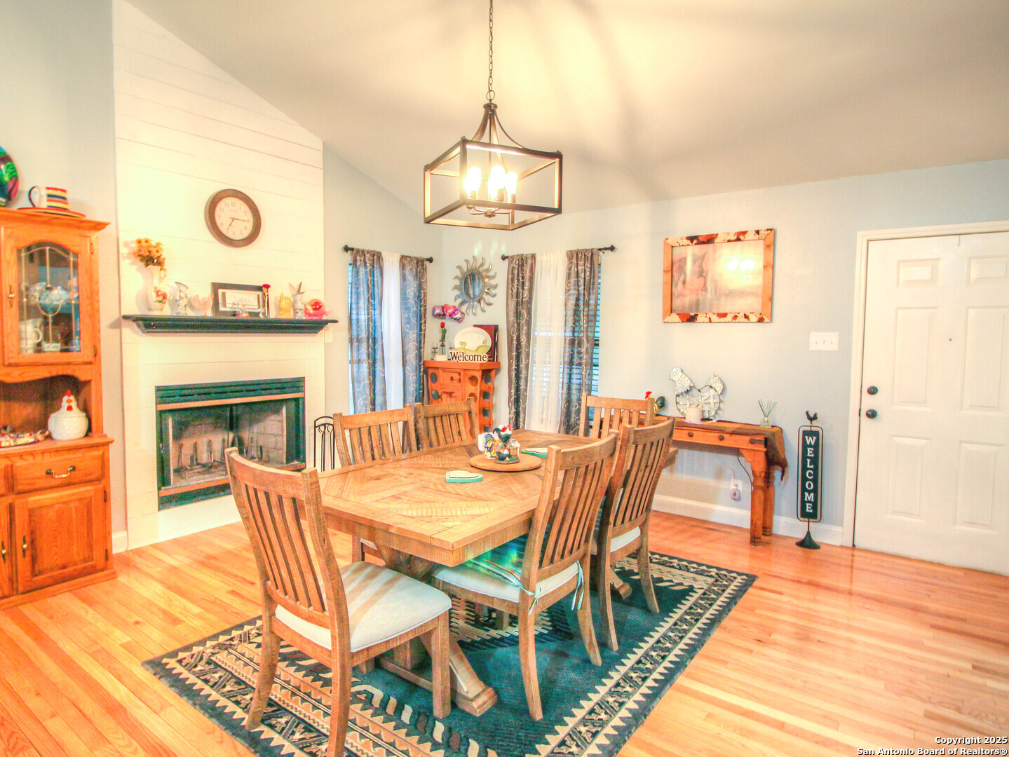 213 Bluebonnet Road La Vernia, TX 78121 - Photo 3 of 48 a dining room with furniture and window