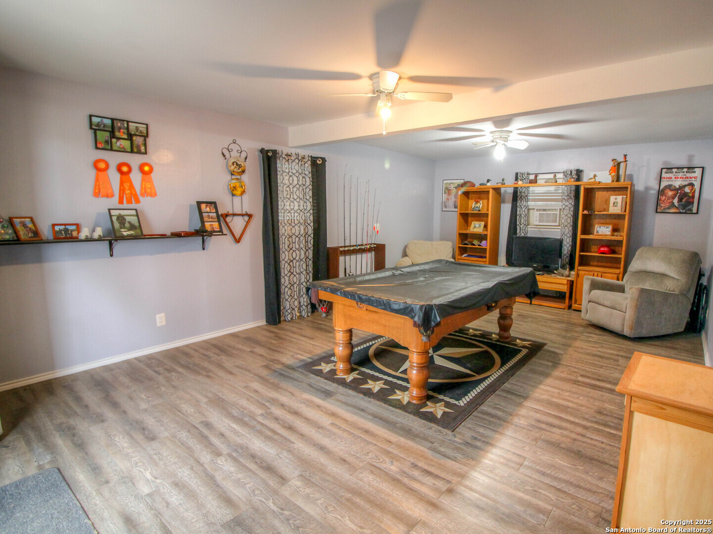 213 Bluebonnet Road La Vernia, TX 78121 - Photo 31 of 48 a room with wooden floor pool table and furniture