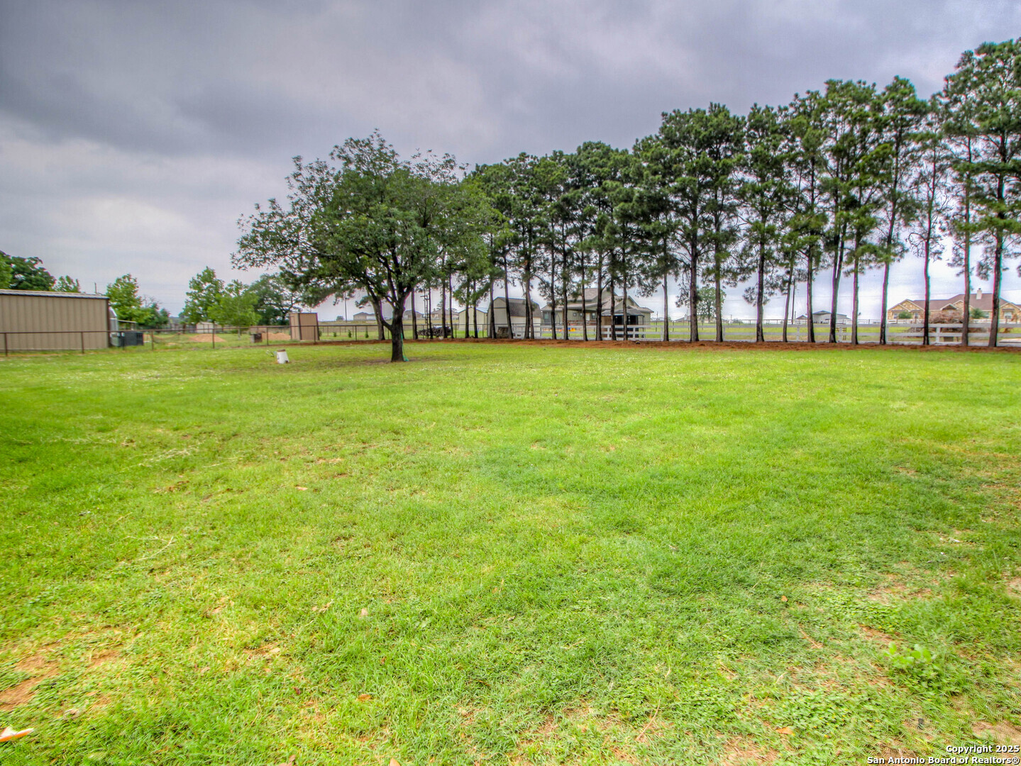 213 Bluebonnet Road La Vernia, TX 78121 - Photo 38 of 48 a view of outdoor space with garden and trees