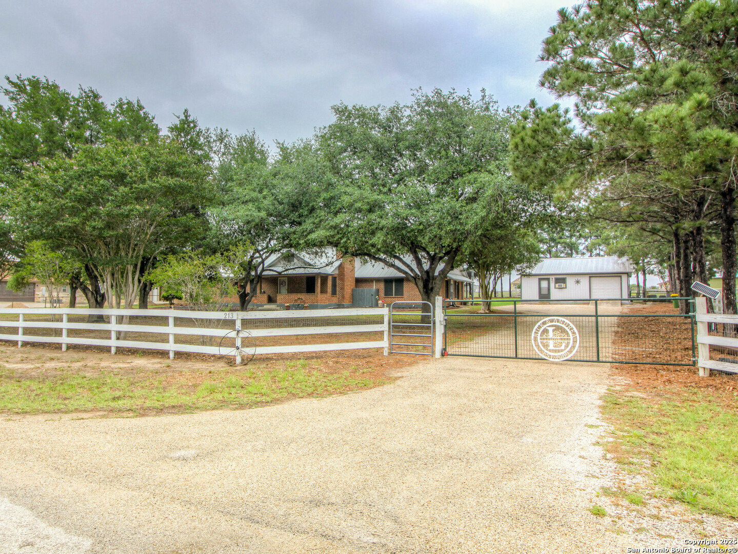 213 Bluebonnet Road La Vernia, TX 78121 - Photo 39 of 48 a view of a swimming pool with an outdoor seating area