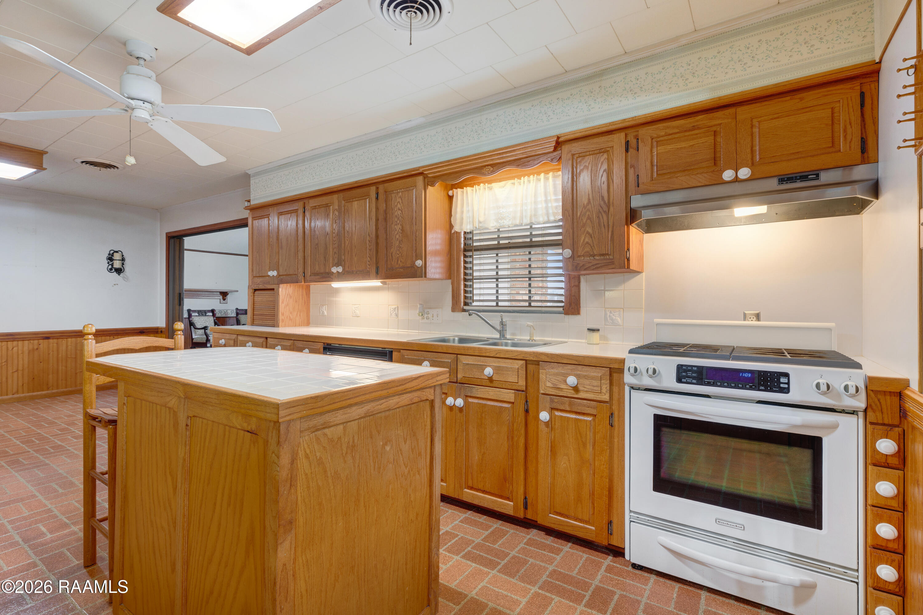 3672 Highway 3043 Opelousas, LA 70570 - Photo 6 of 37 Gas stove, island, pantry