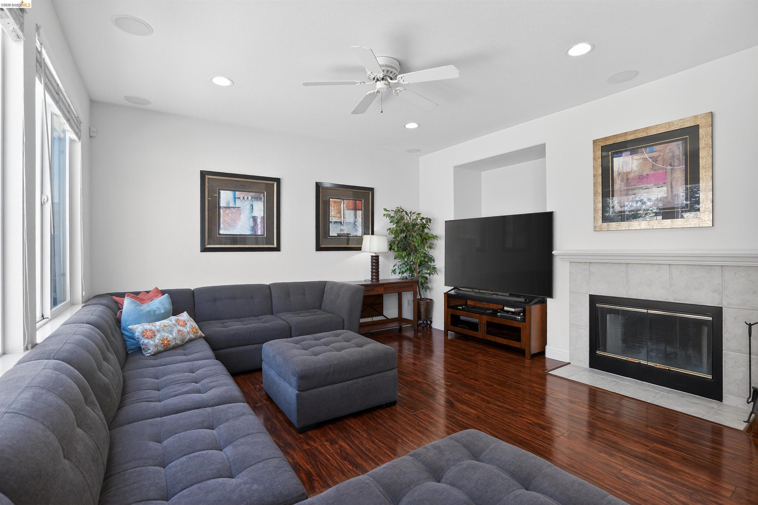 1221 Andrea Way Vallejo, CA 94591 - Photo 14 of 29 Living area featuring rich wood-finish flooring, recessed lighting, and a ceiling fan