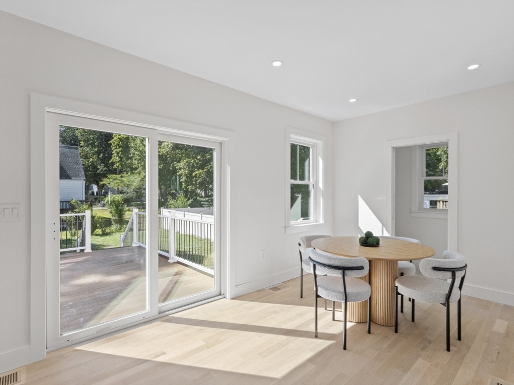 10 Ames Street Wakefield, MA 01880 - Photo 18 of 42 a workspace with furniture and a window