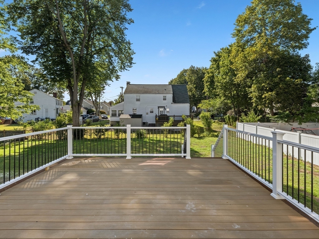 10 Ames Street Wakefield, MA 01880 - Photo 19 of 42 a view of a park with wooden fence
