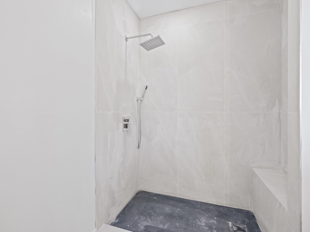 10 Ames Street Wakefield, MA 01880 - Photo 23 of 42 a small space with a shower