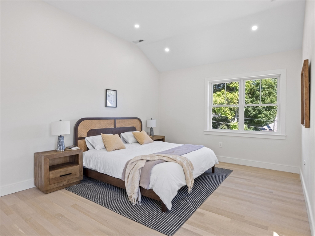 10 Ames Street Wakefield, MA 01880 - Photo 26 of 42 a bedroom with a bed and a window