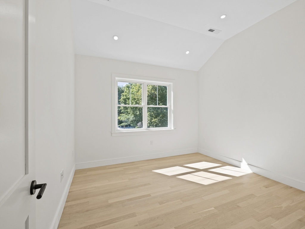 10 Ames Street Wakefield, MA 01880 - Photo 34 of 42 an empty room with a window