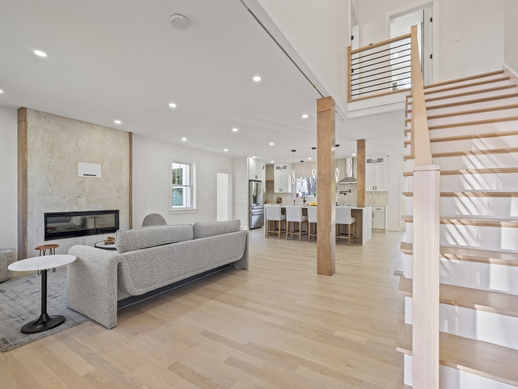 10 Ames Street Wakefield, MA 01880 - Photo 4 of 42 a living room with furniture and white walls