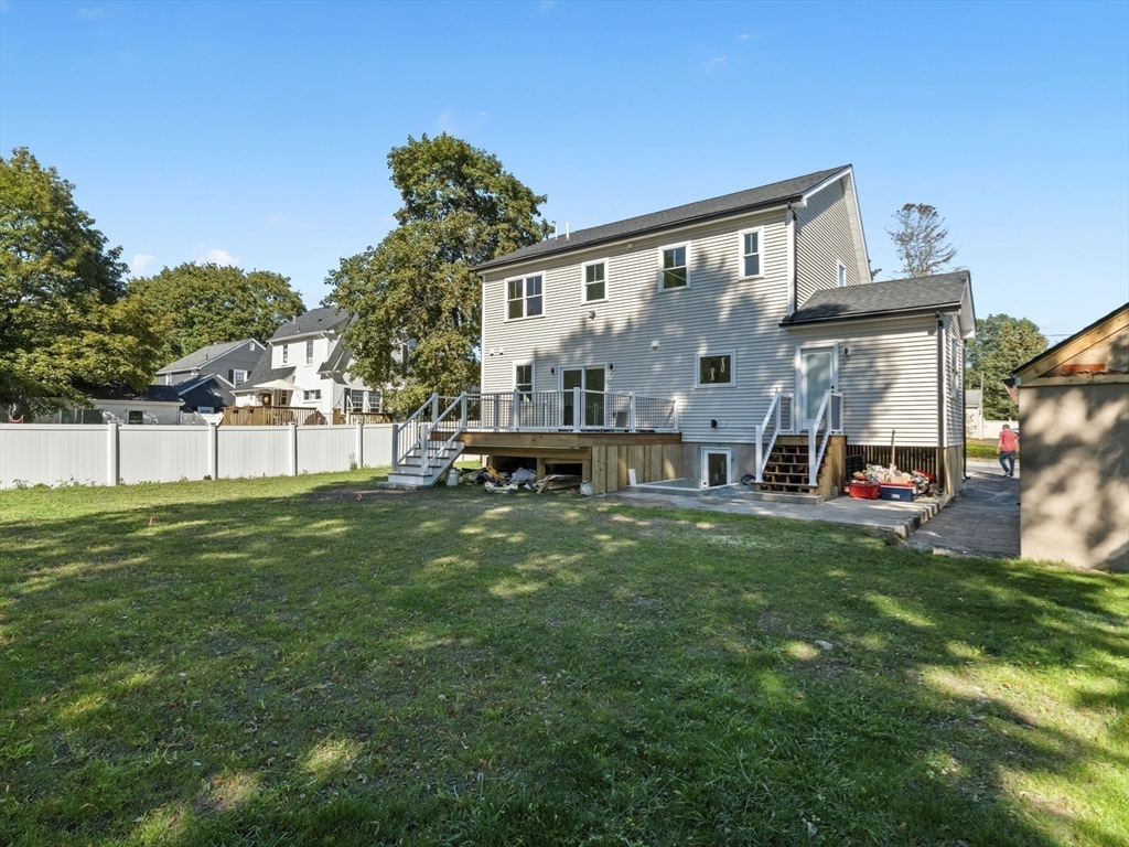 10 Ames Street Wakefield, MA 01880 - Photo 41 of 42 a house view with a garden space