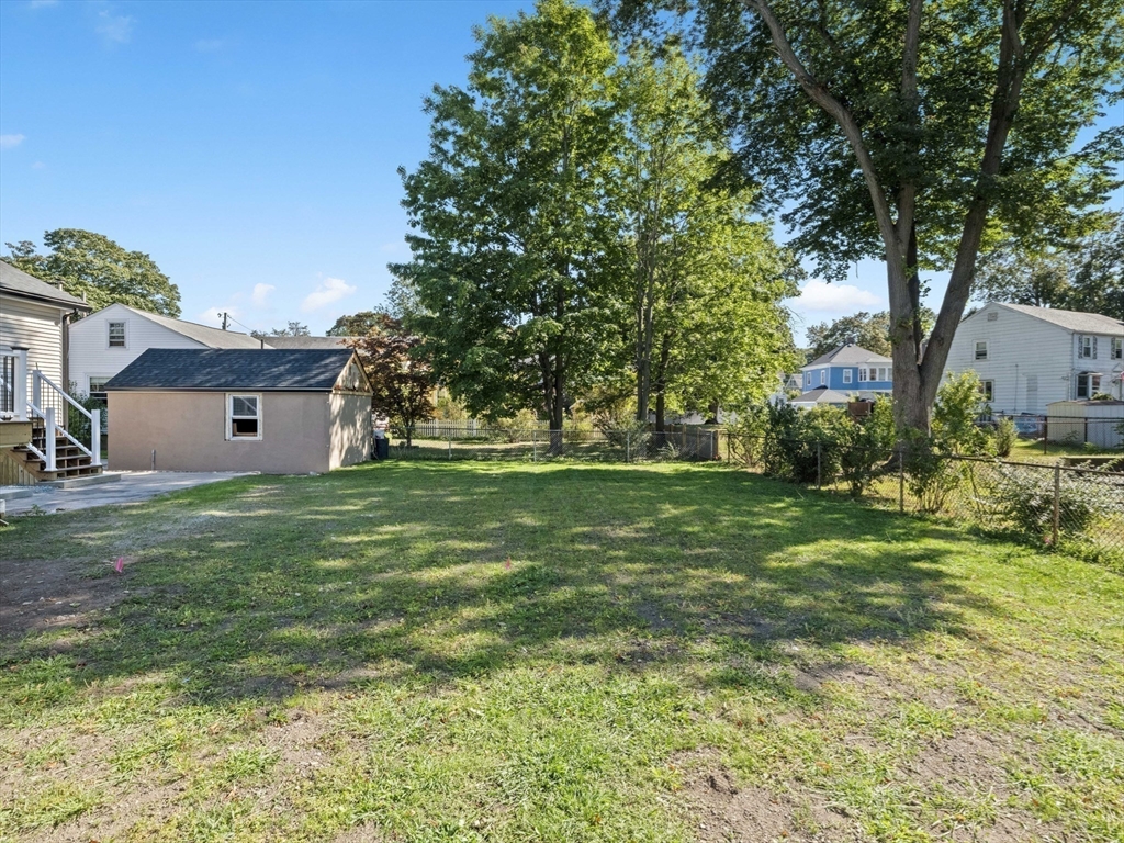 10 Ames Street Wakefield, MA 01880 - Photo 42 of 42 a view of a house with a yard