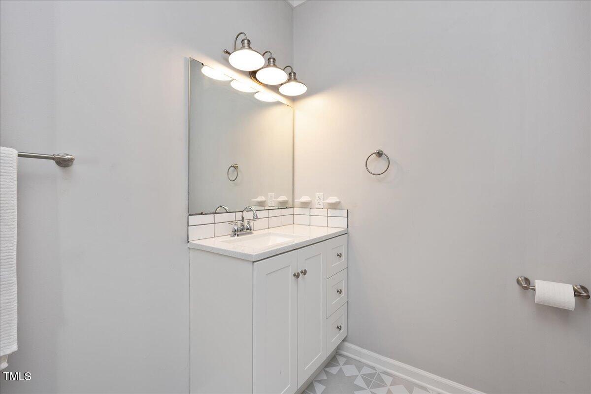 1933 Fletchers Chapel Road Durham, NC 27703 - Photo 17 of 61 primary en suite shower