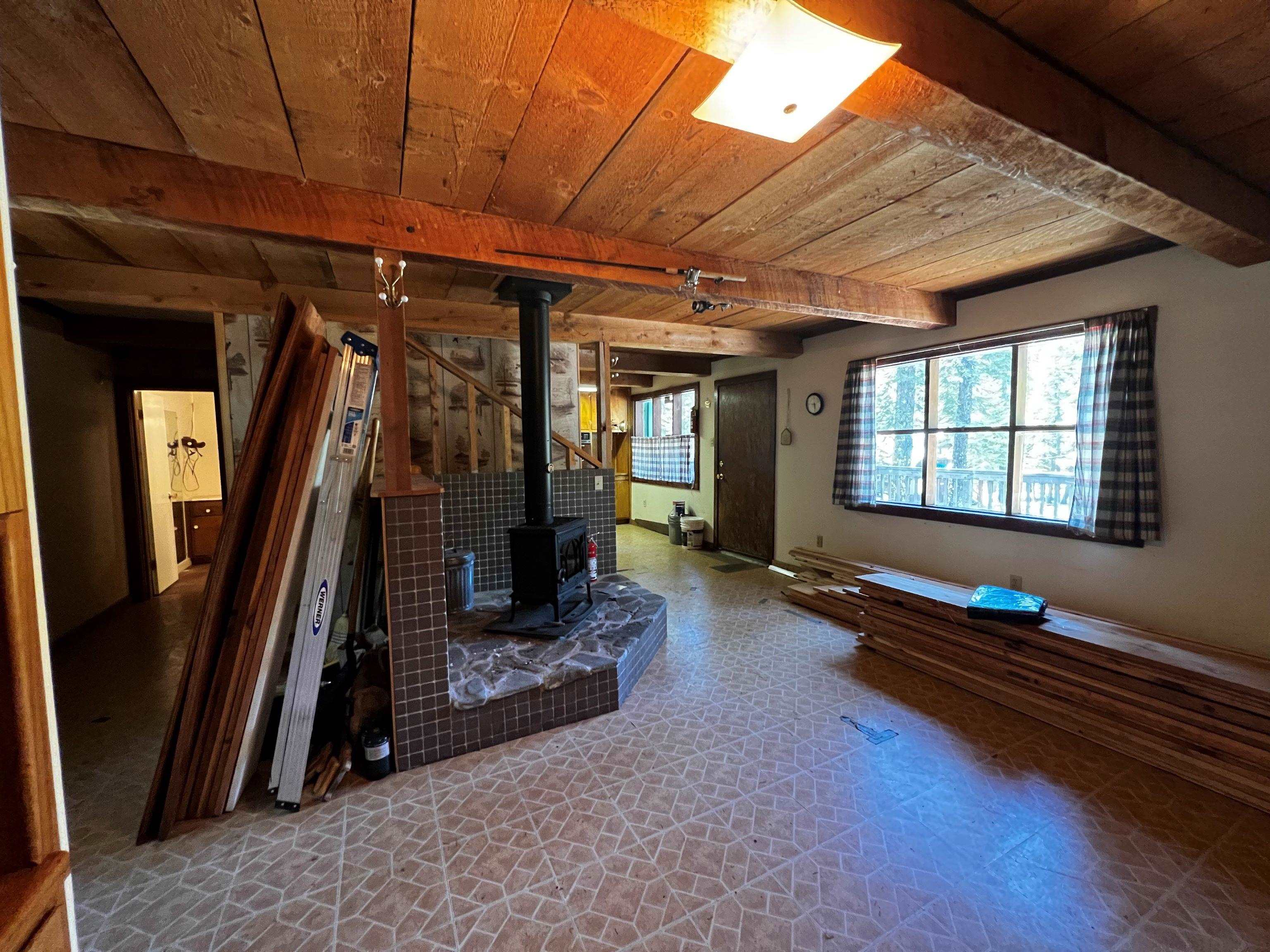 23 Haskell Creek Road, Unit 23 Calpine, CA 96124 - Photo 5 of 15 a room with gym equipment and a large window