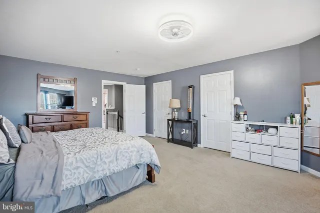a bathroom with a sink double vanity and a mirror