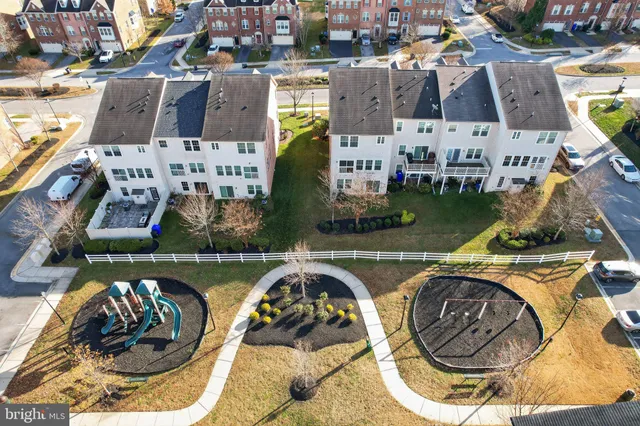 an aerial view of a house with swimming pool