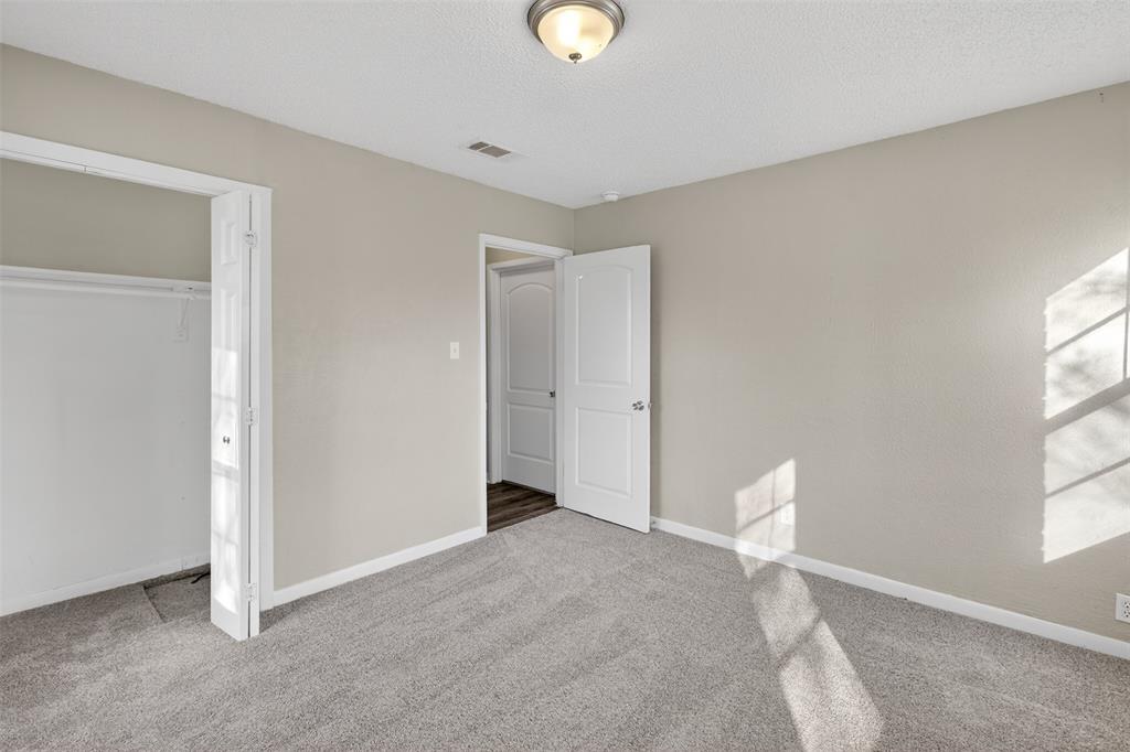 701 Harrison Lane Hurst, TX 76053 - Photo 13 of 29 a view of livingroom with window