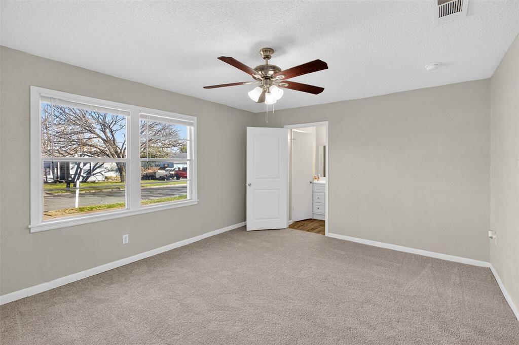 701 Harrison Lane Hurst, TX 76053 - Photo 17 of 29 a view of an empty room with a window