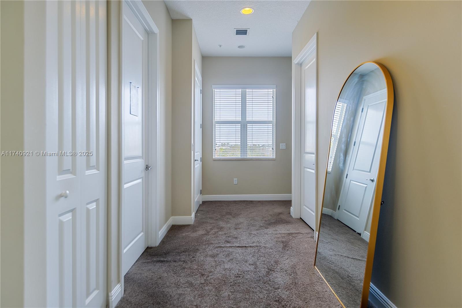 1799 Northwest 124th Way, Unit 1799 Pembroke Pines, FL 33028 - Photo 19 of 40 a view of entryway with wooden floor
