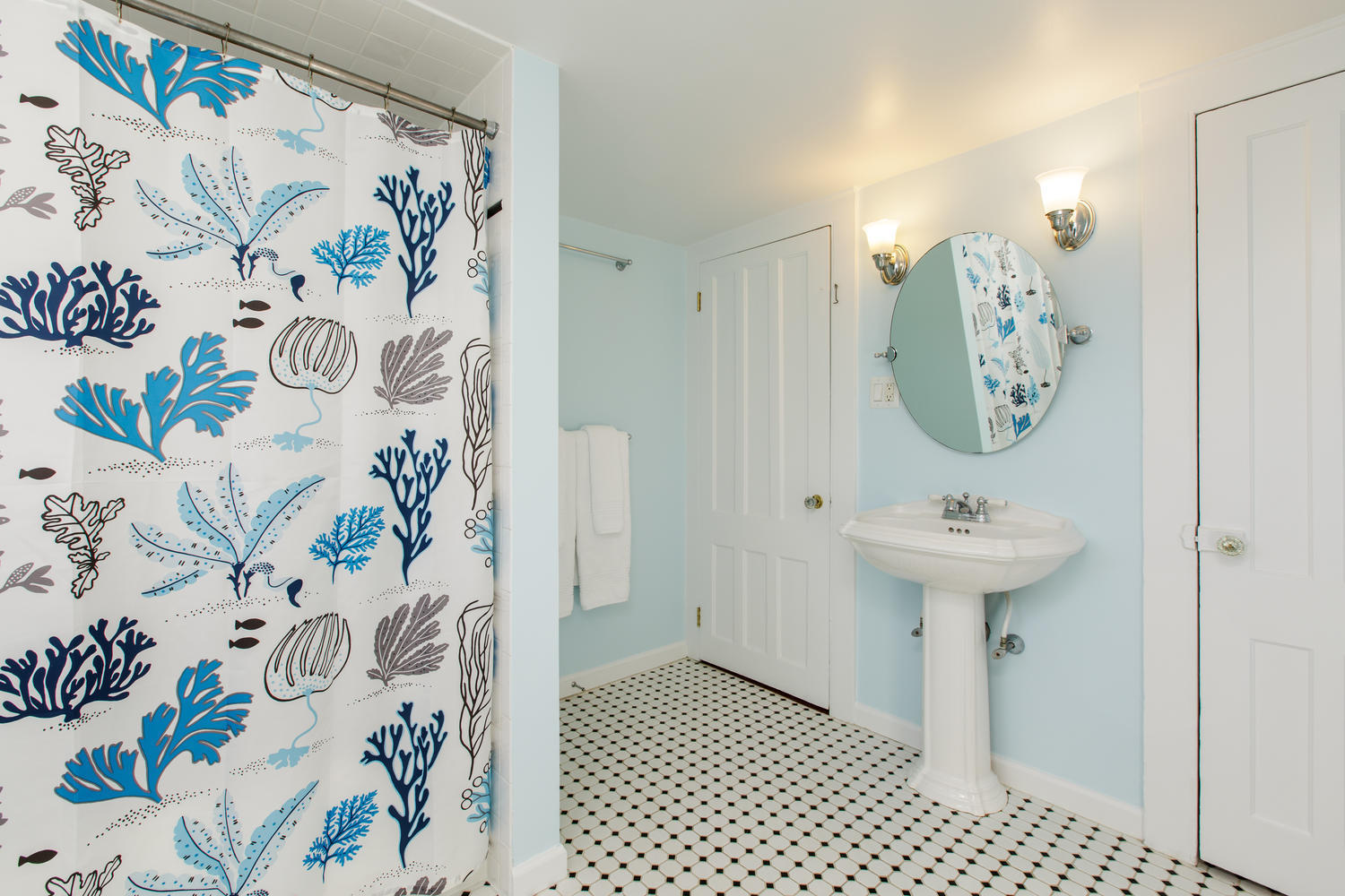 12 Roton Avenue Rowayton, CT 06853 - Photo 17 of 31 a bathroom with a sink and a mirror