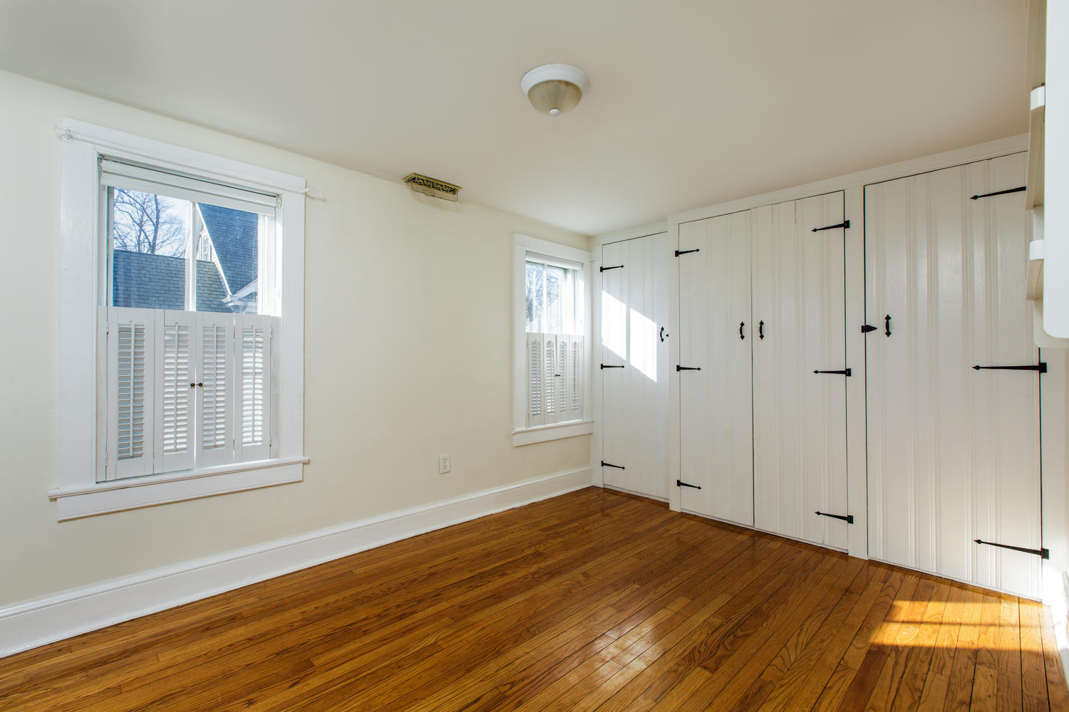 12 Roton Avenue Rowayton, CT 06853 - Photo 19 of 31 a view of empty room with wooden floor and fan