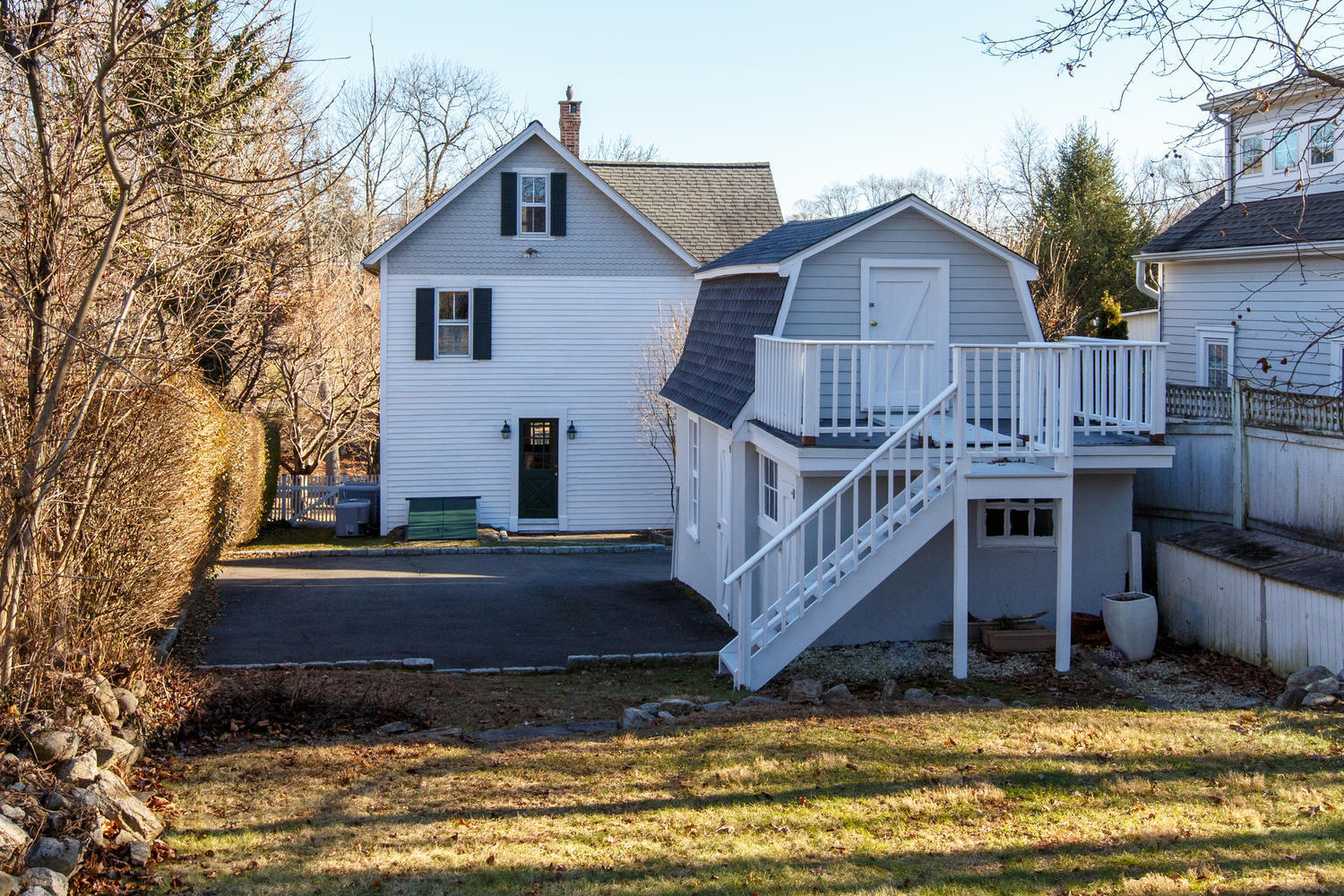12 Roton Avenue Rowayton, CT 06853 - Photo 25 of 31 a view of a house with wooden floor and a small yard