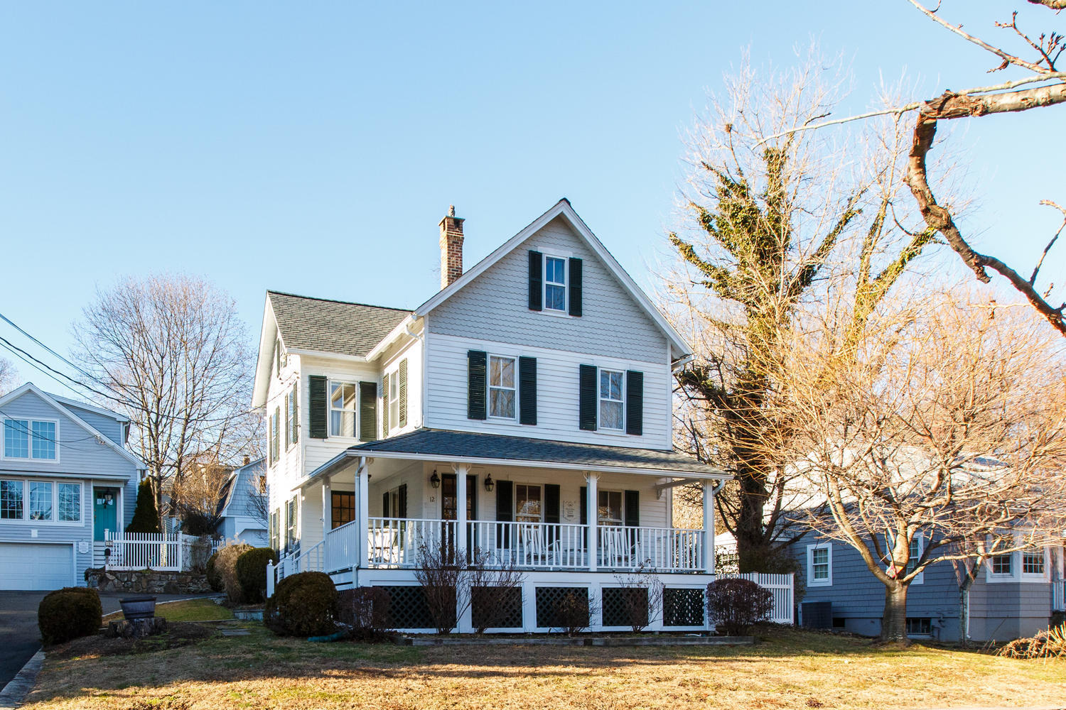 12 Roton Avenue Rowayton, CT 06853 - Photo 27 of 31 a front view of a house with a yard