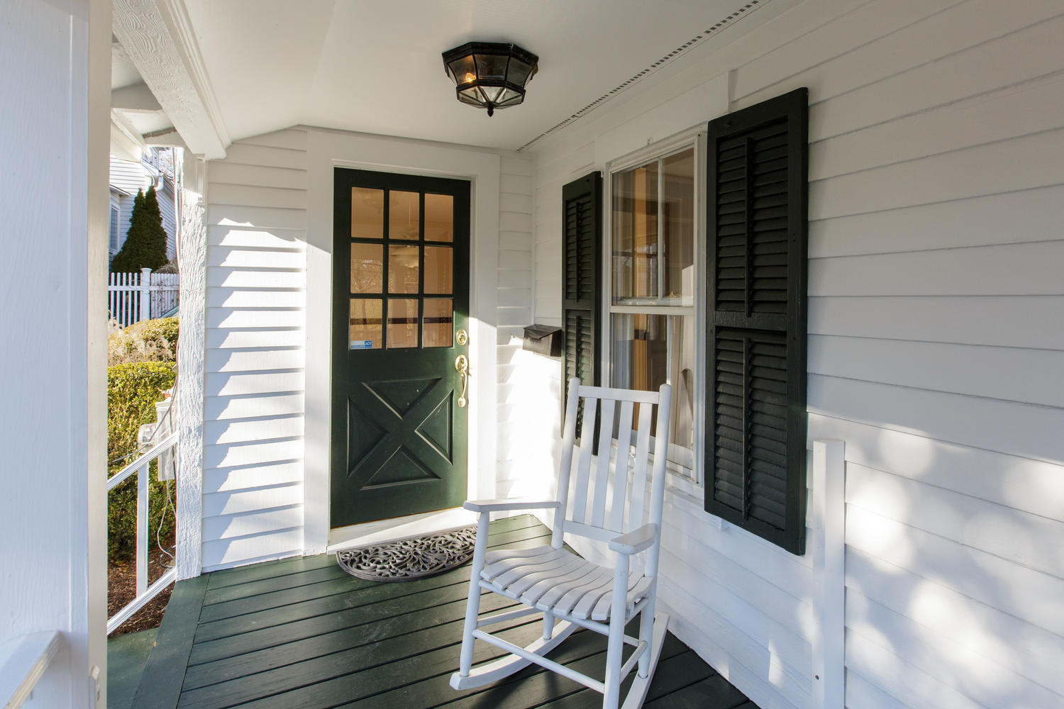 12 Roton Avenue Rowayton, CT 06853 - Photo 7 of 31 a view of a porch with wooden floor and outdoor space