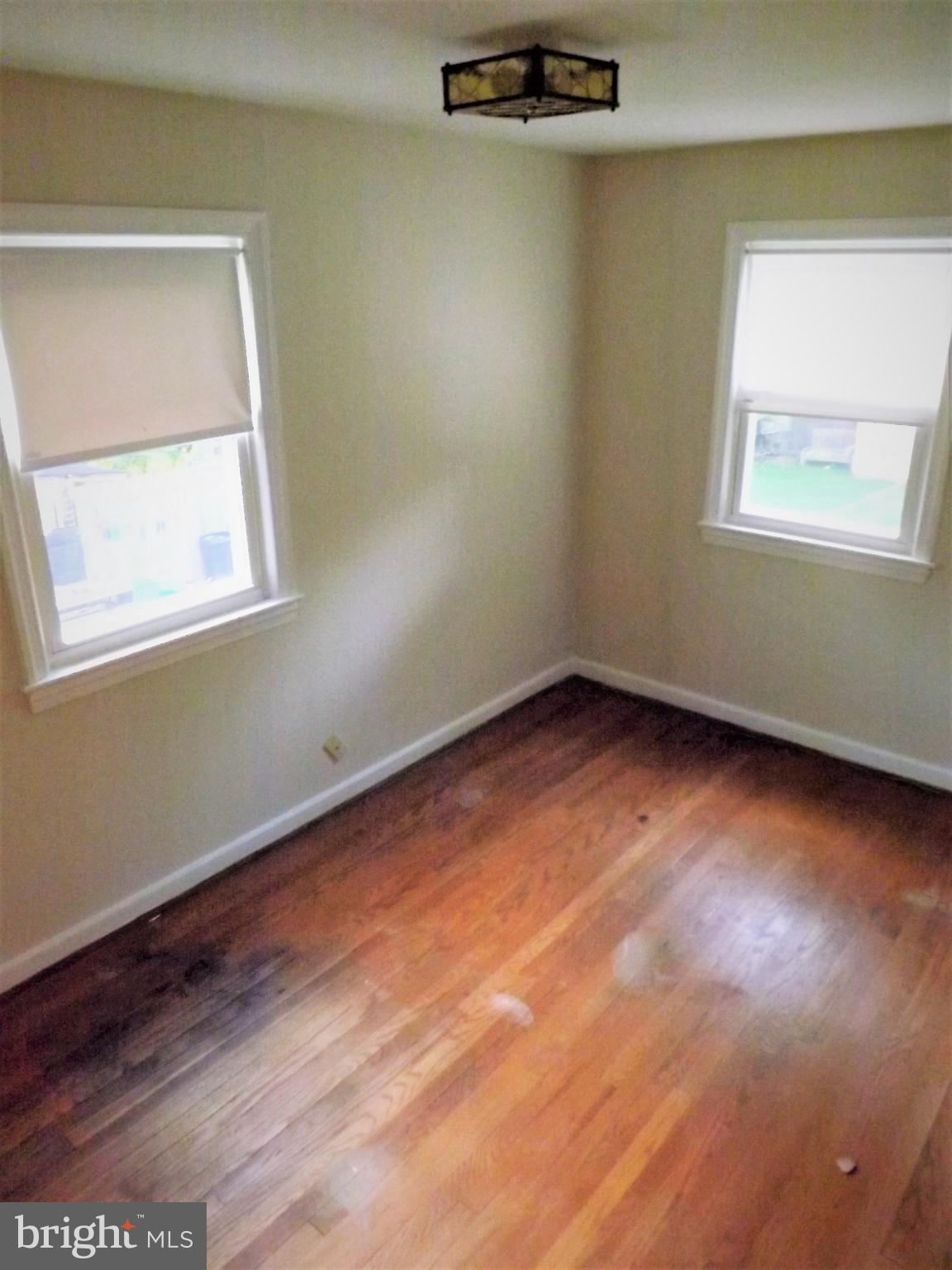 11936 Bluhill Road Silver Spring, MD 20902 - Photo 21 of 30 an empty room with a window