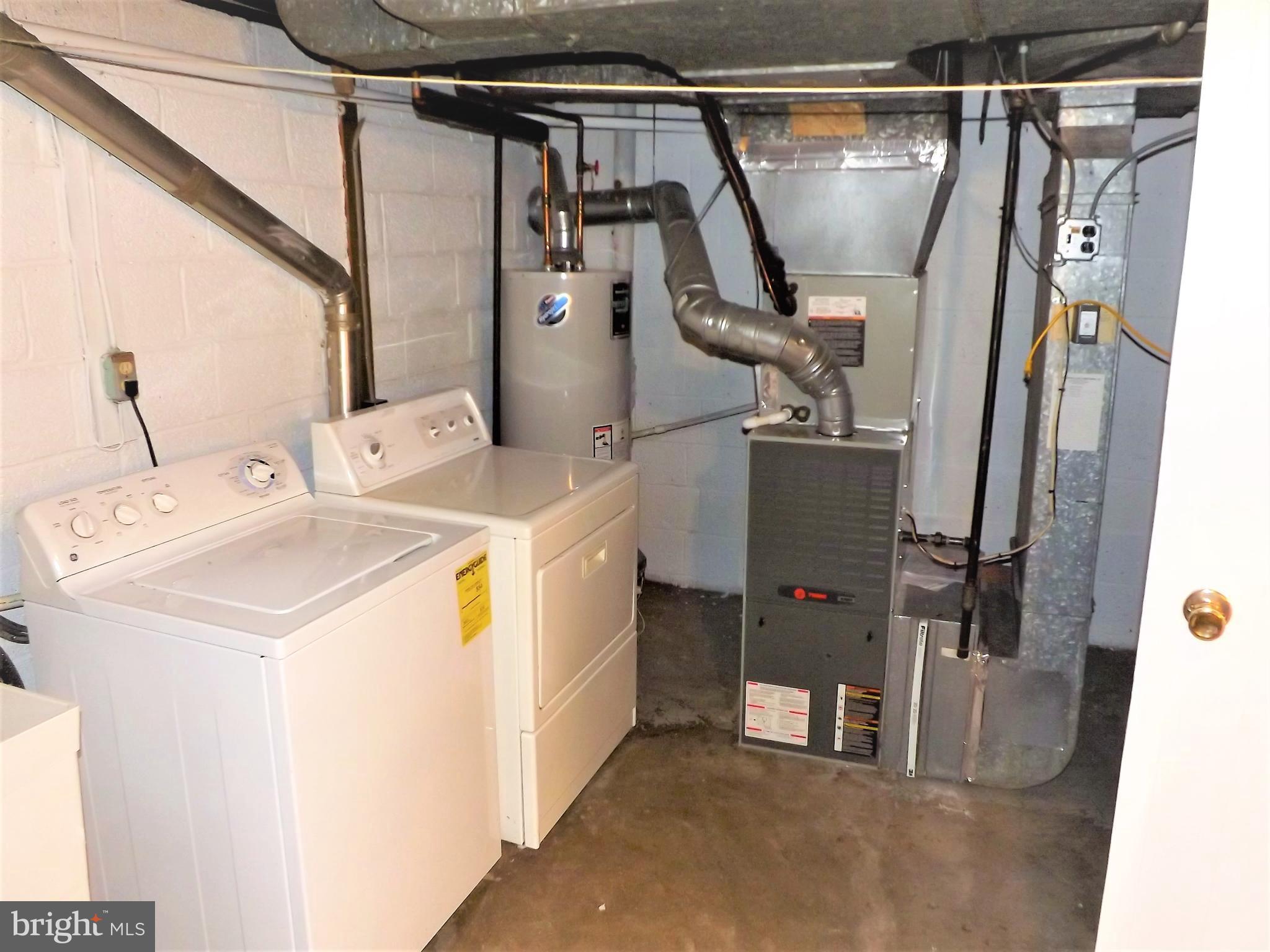 11936 Bluhill Road Silver Spring, MD 20902 - Photo 24 of 30 a utility room with dryer and washer