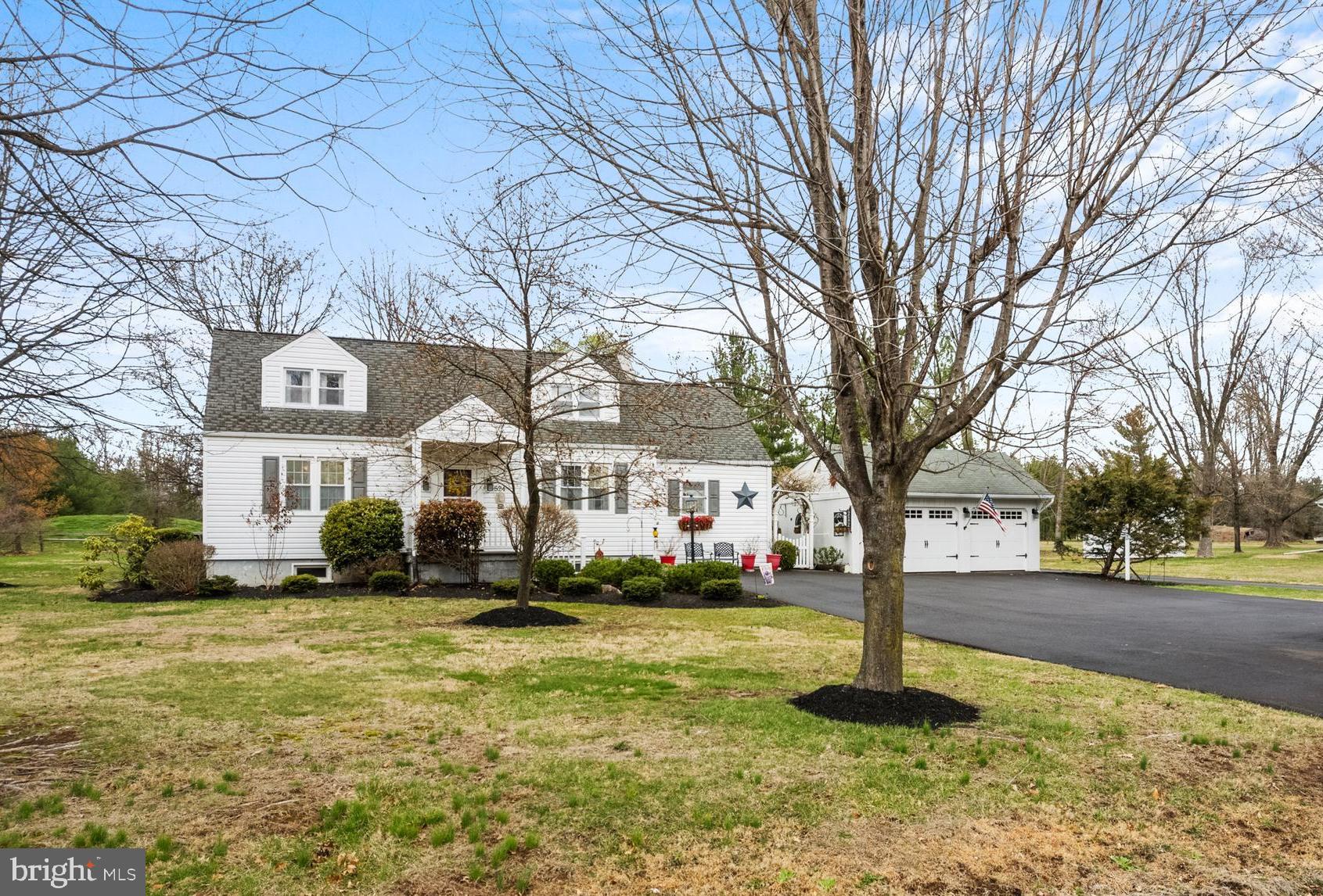 524 Scott Road Perkasie, PA 18944 - Photo 2 of 38 a front view of a house with a yard