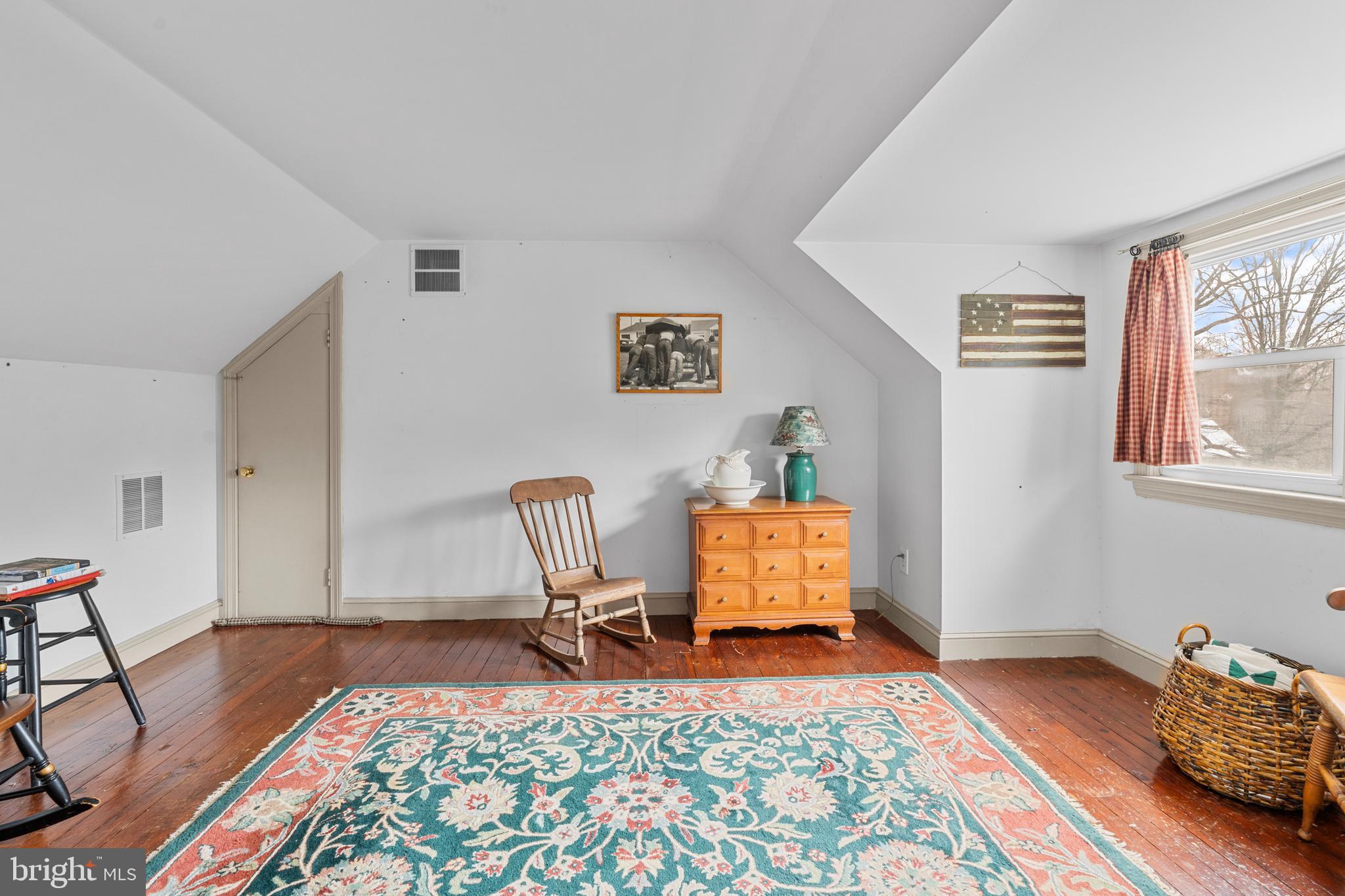 524 Scott Road Perkasie, PA 18944 - Photo 21 of 38 a living room with furniture and a rug