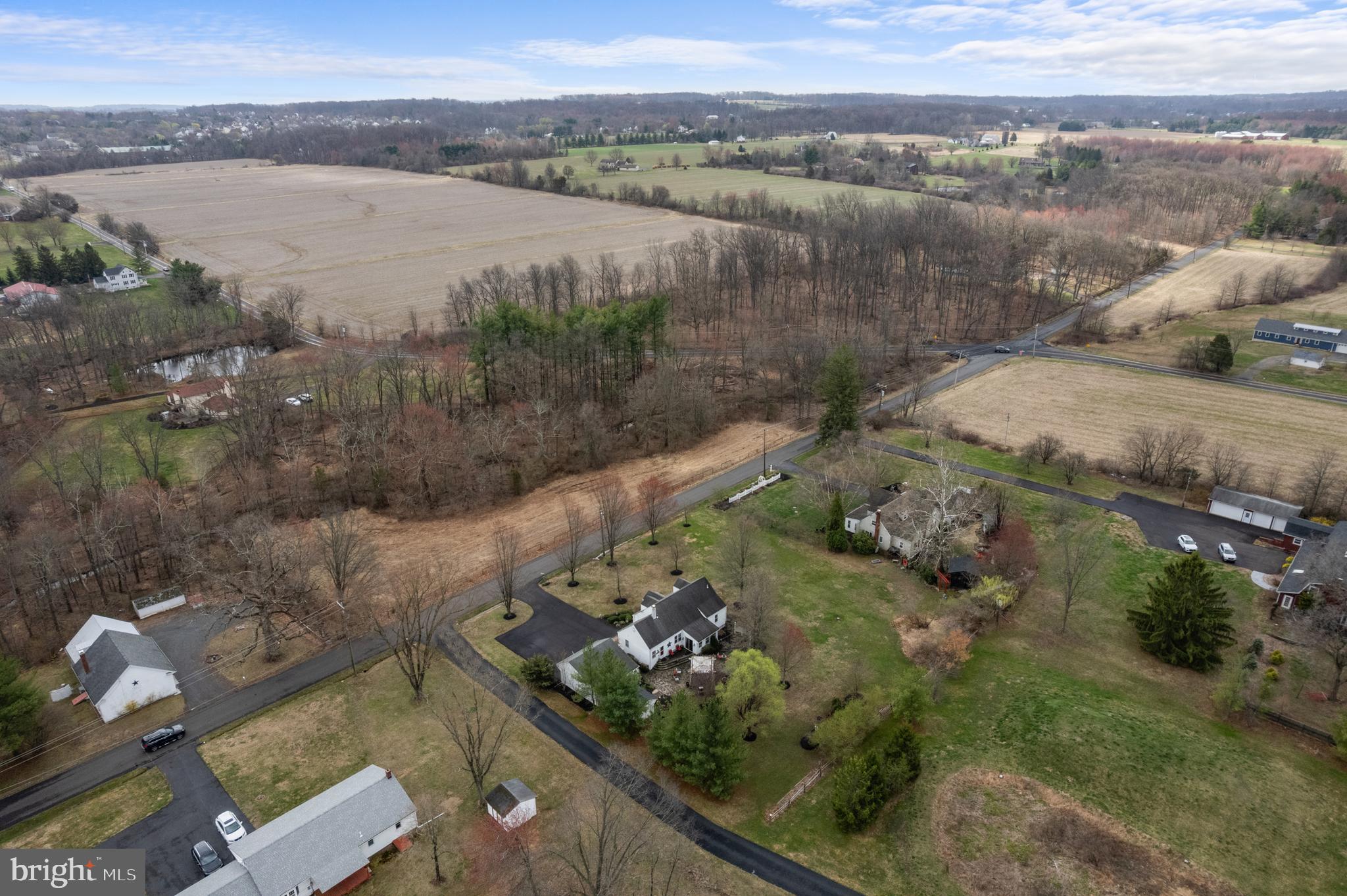 524 Scott Road Perkasie, PA 18944 - Photo 28 of 38 a view of a lake with a mountain in the background
