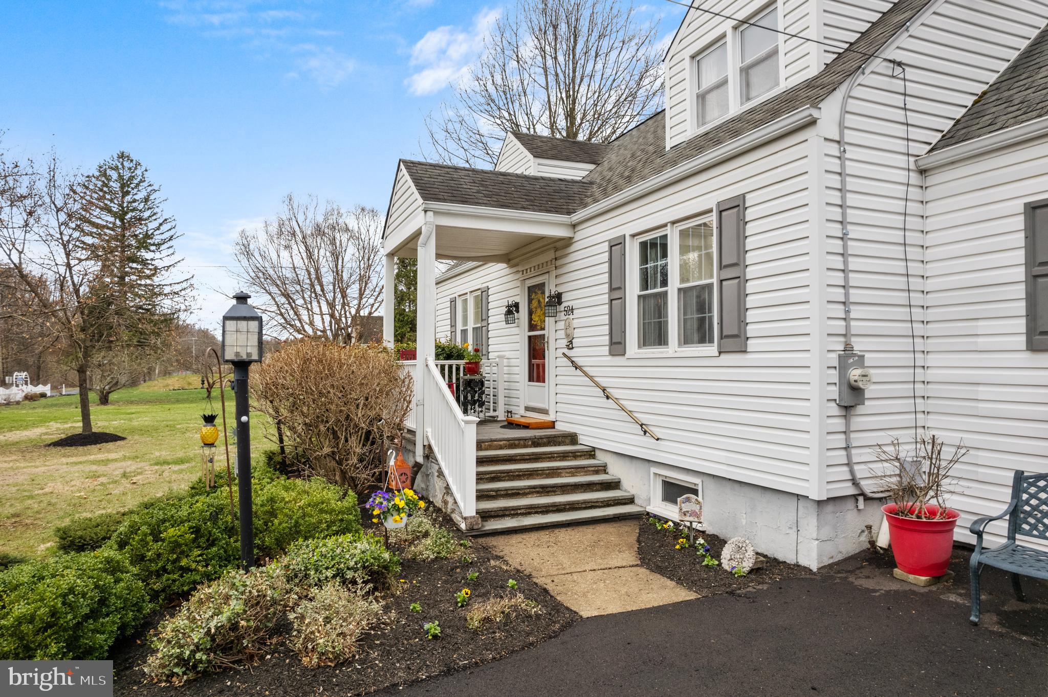 524 Scott Road Perkasie, PA 18944 - Photo 3 of 38 a porch with seating space