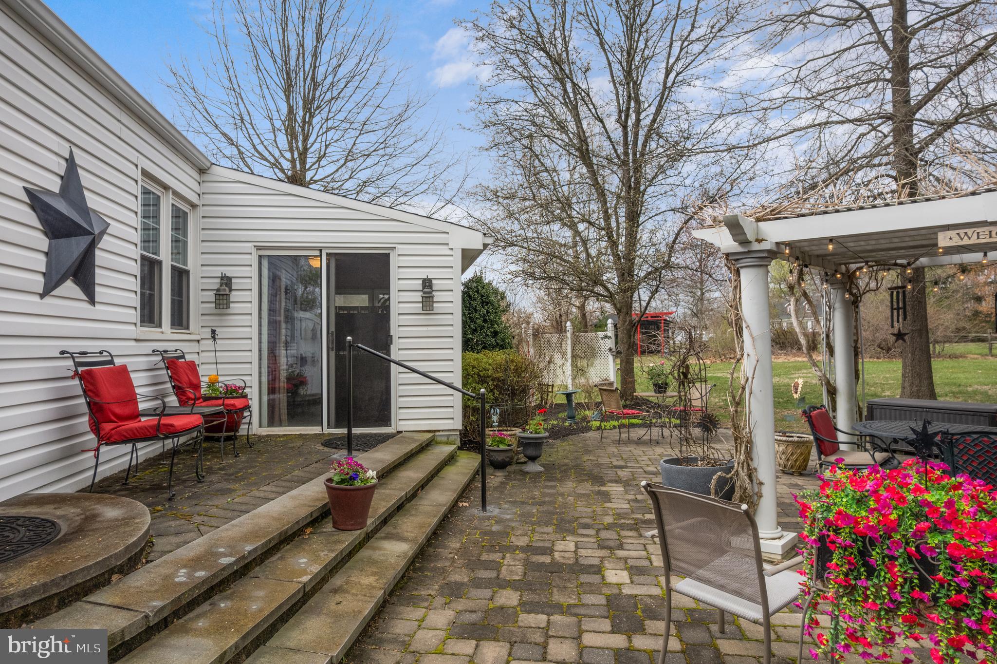 524 Scott Road Perkasie, PA 18944 - Photo 33 of 38 a view of a chairs and tables in the patio