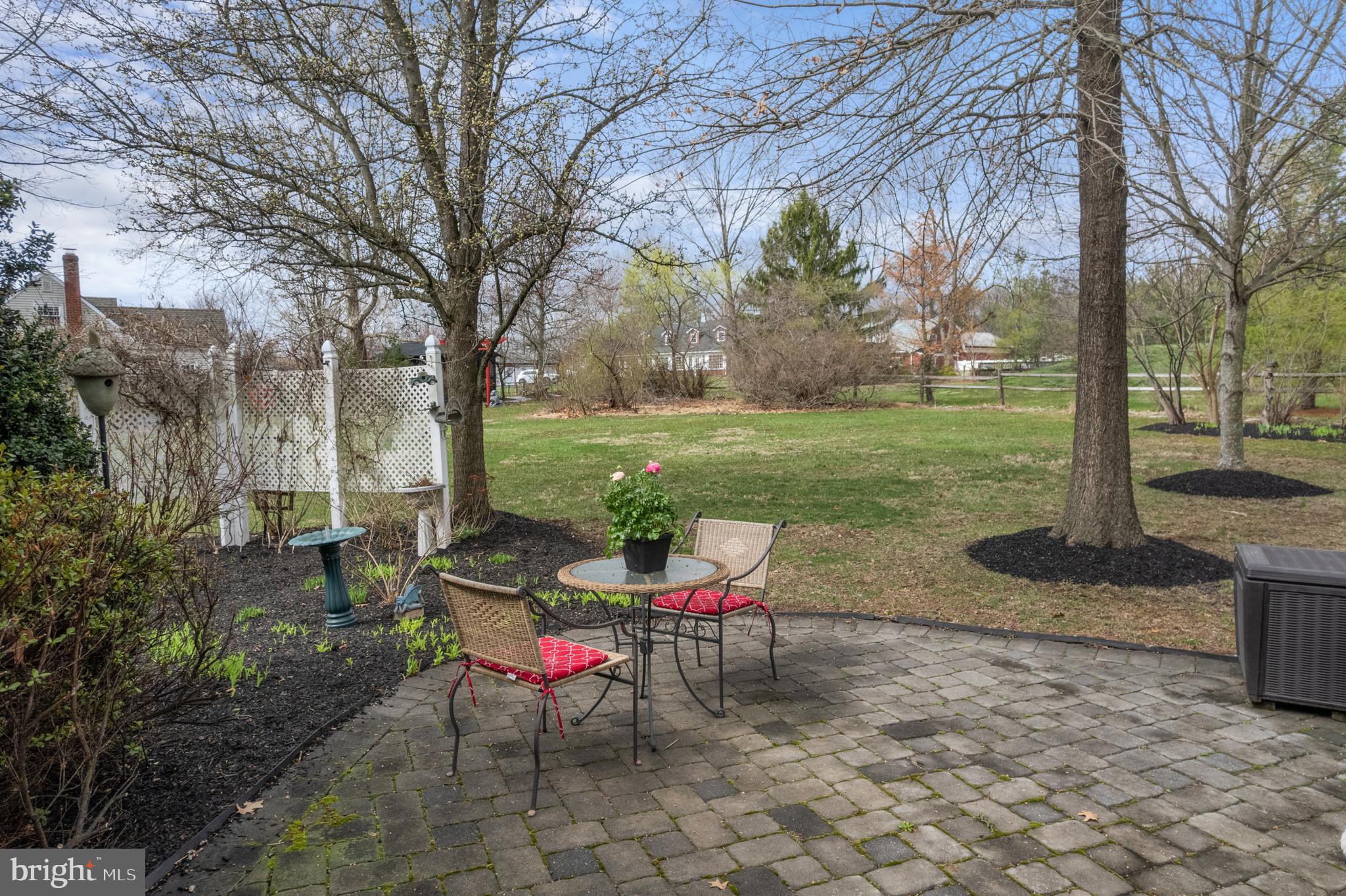 524 Scott Road Perkasie, PA 18944 - Photo 35 of 38 a view of a backyard with table and chairs fire pit and a large tree