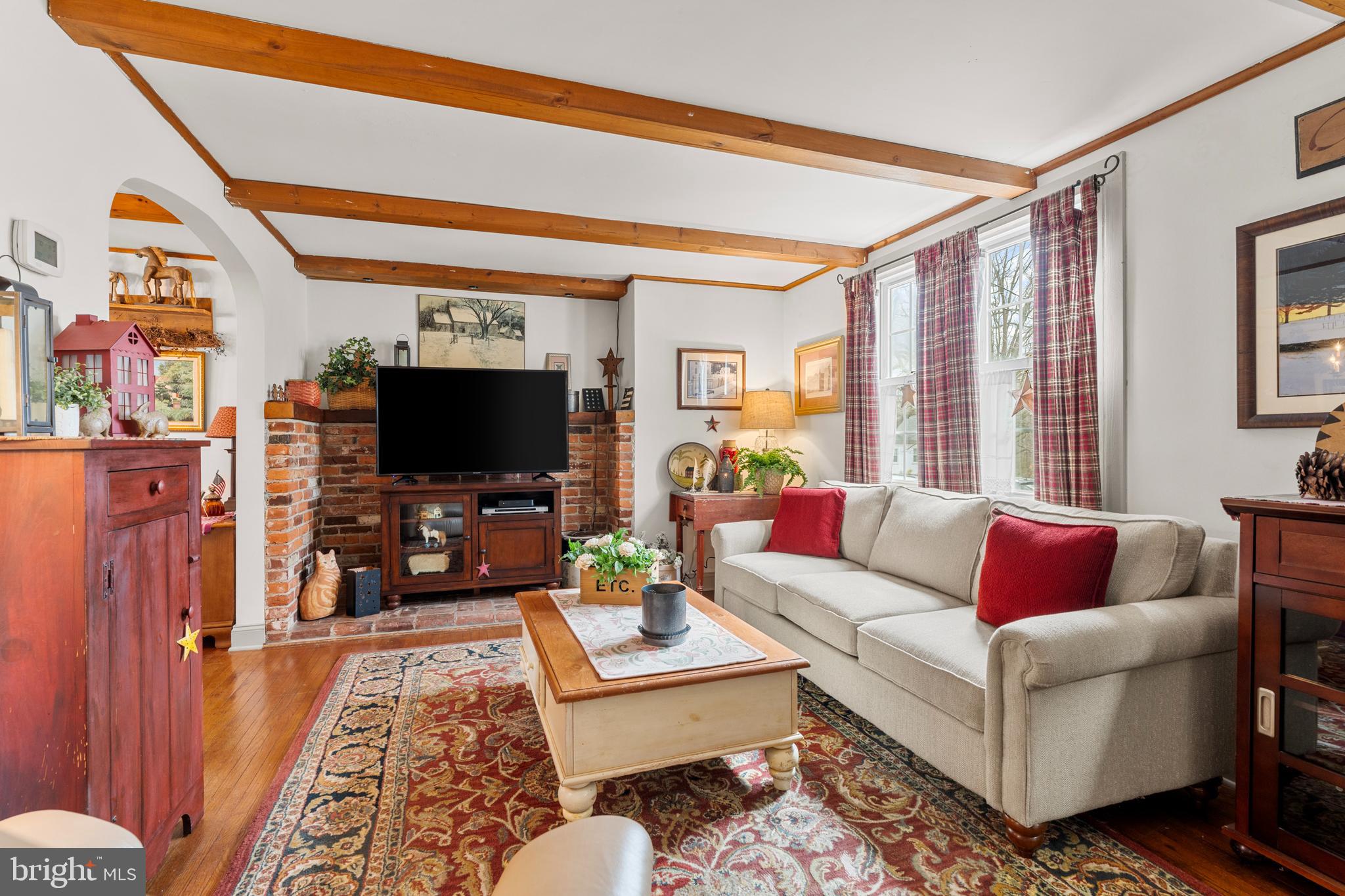 524 Scott Road Perkasie, PA 18944 - Photo 4 of 38 a living room with furniture and a flat screen tv