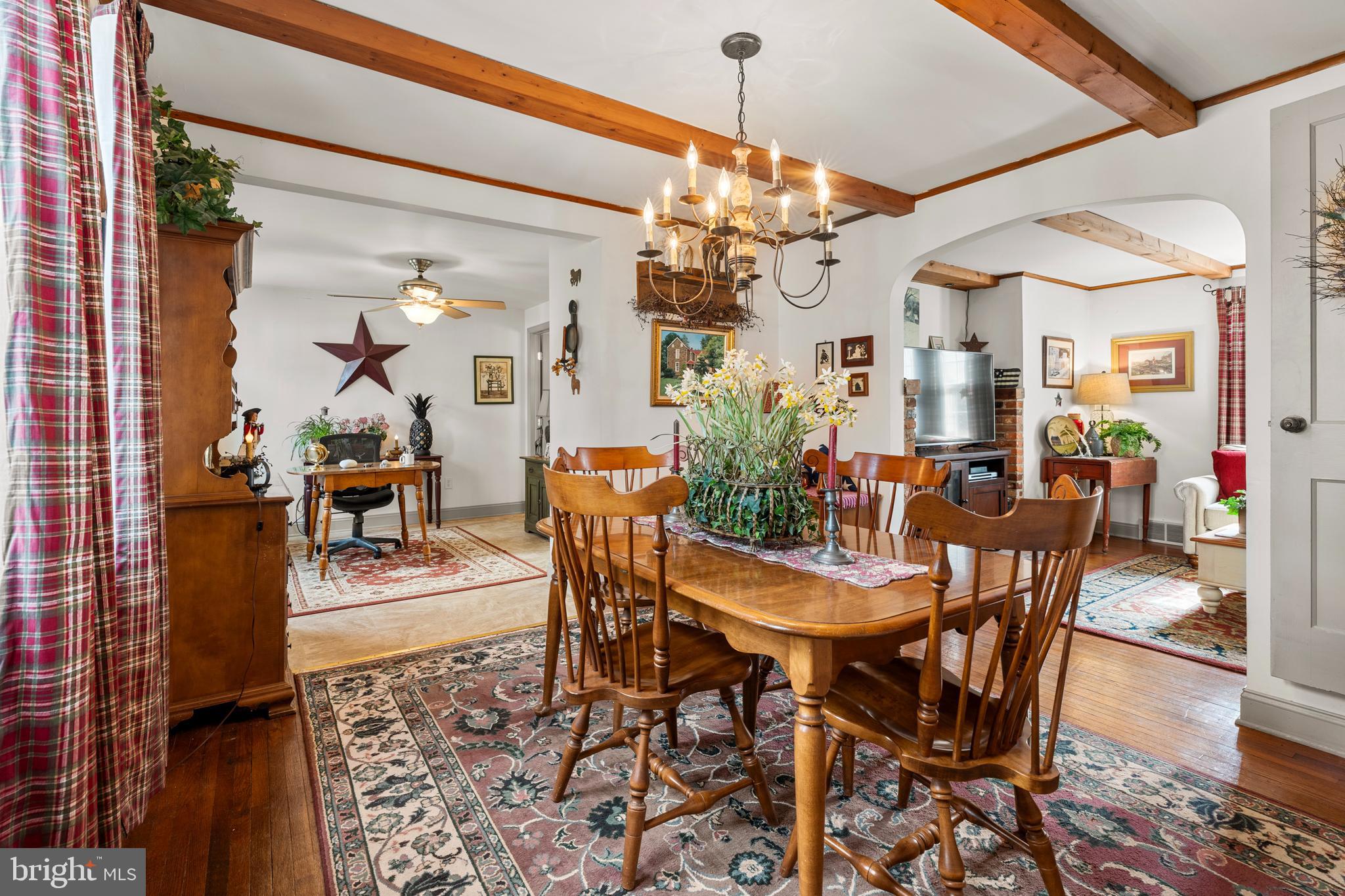 524 Scott Road Perkasie, PA 18944 - Photo 7 of 38 a view of a dining room with furniture and chandelier