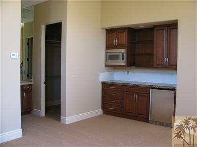 19 Sun Ridge Circle Rancho Mirage, CA 92270 - Photo 3 of 25 a kitchen with stainless steel appliances granite countertop cabinets and sink