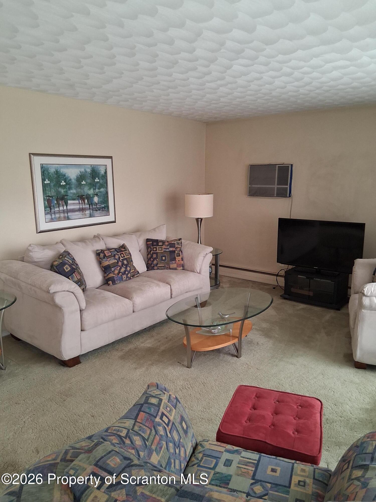 5 Monarch Road Wilkes Barre, PA 18706 - Photo 11 of 35 a living room with furniture and a fireplace