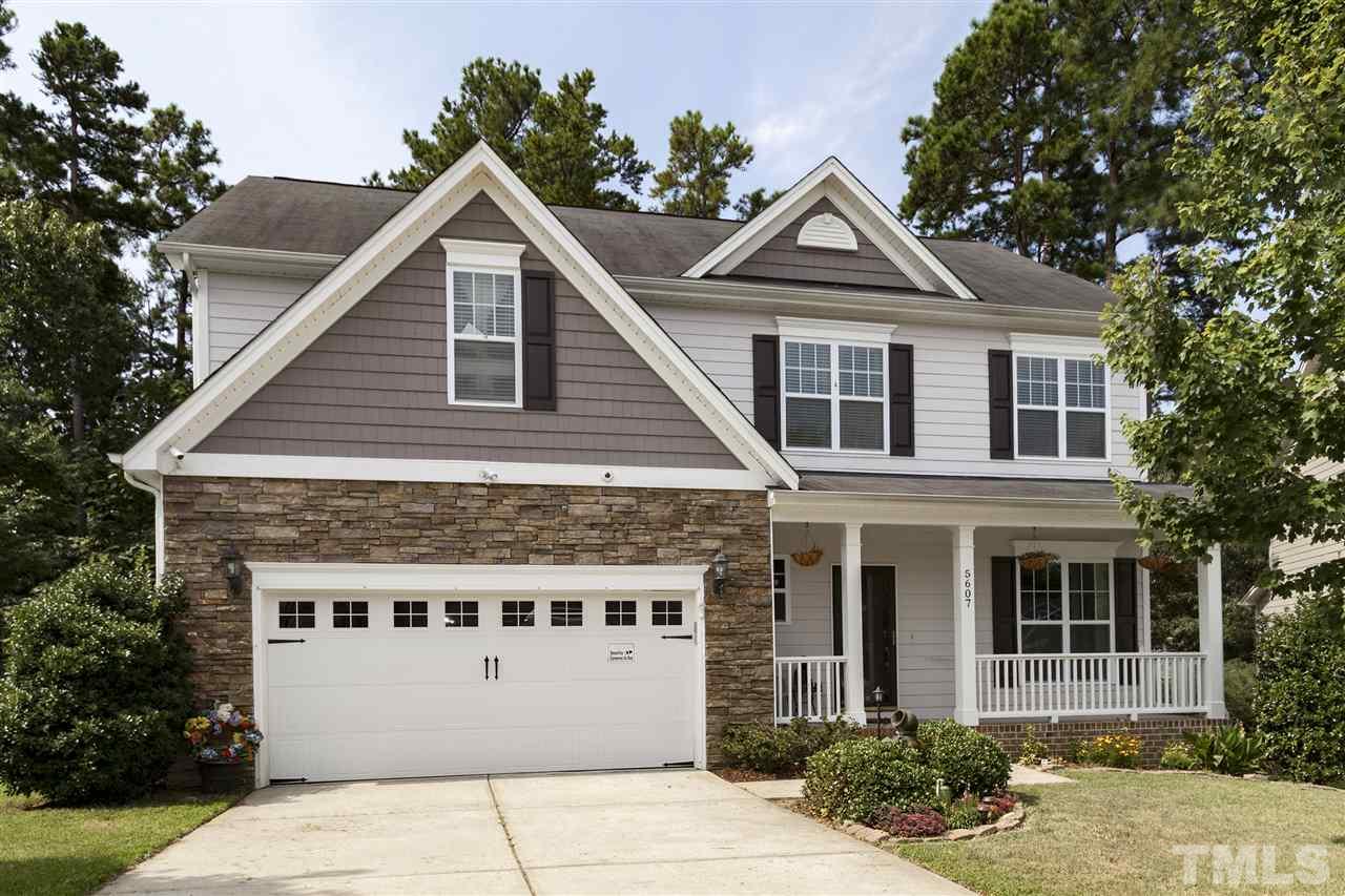 5607 Spring Glen Lane Raleigh, NC 27616 - Photo 1 of 21 a front view of a house with a yard