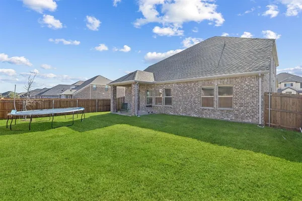 a bathroom with 2 sink and a mirror