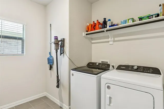 a kitchen with a sink stove and refrigerator