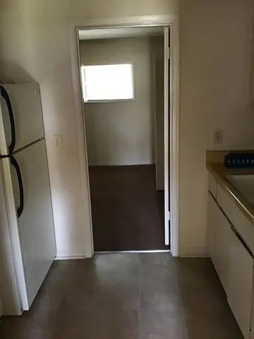 a close view of utility room and stove