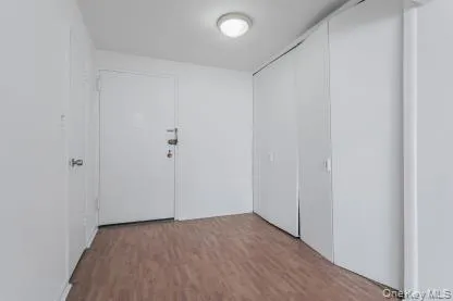 a view of a livingroom with wooden floor