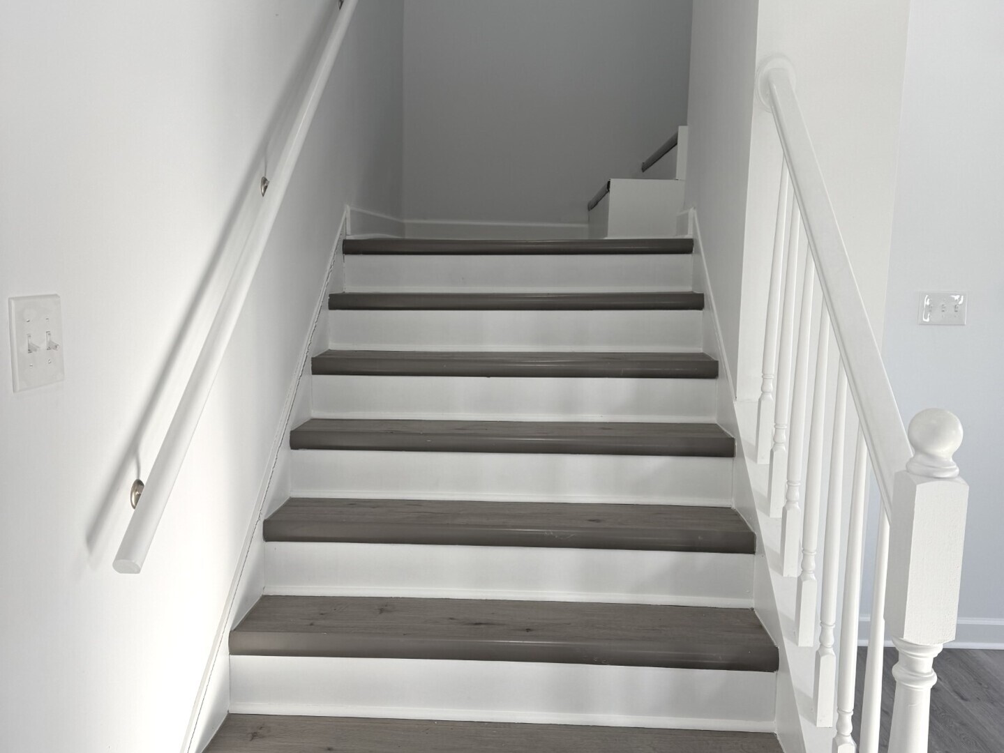 15351 3rd Avenue Phoenix, IL 60426 - Photo 9 of 12 a view of staircase with white walls