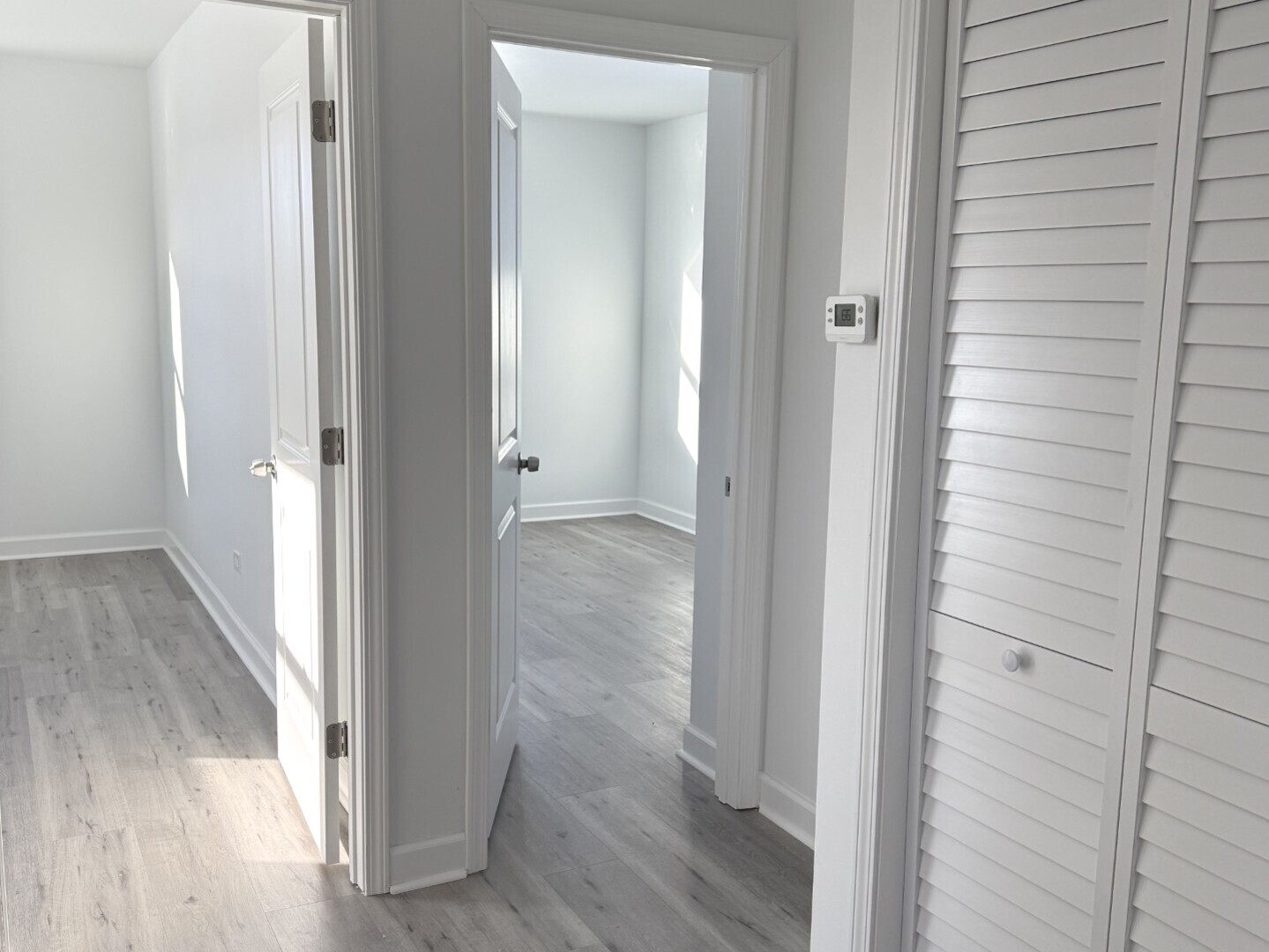 15351 3rd Avenue Phoenix, IL 60426 - Photo 10 of 12 a view of a bathroom from a hallway