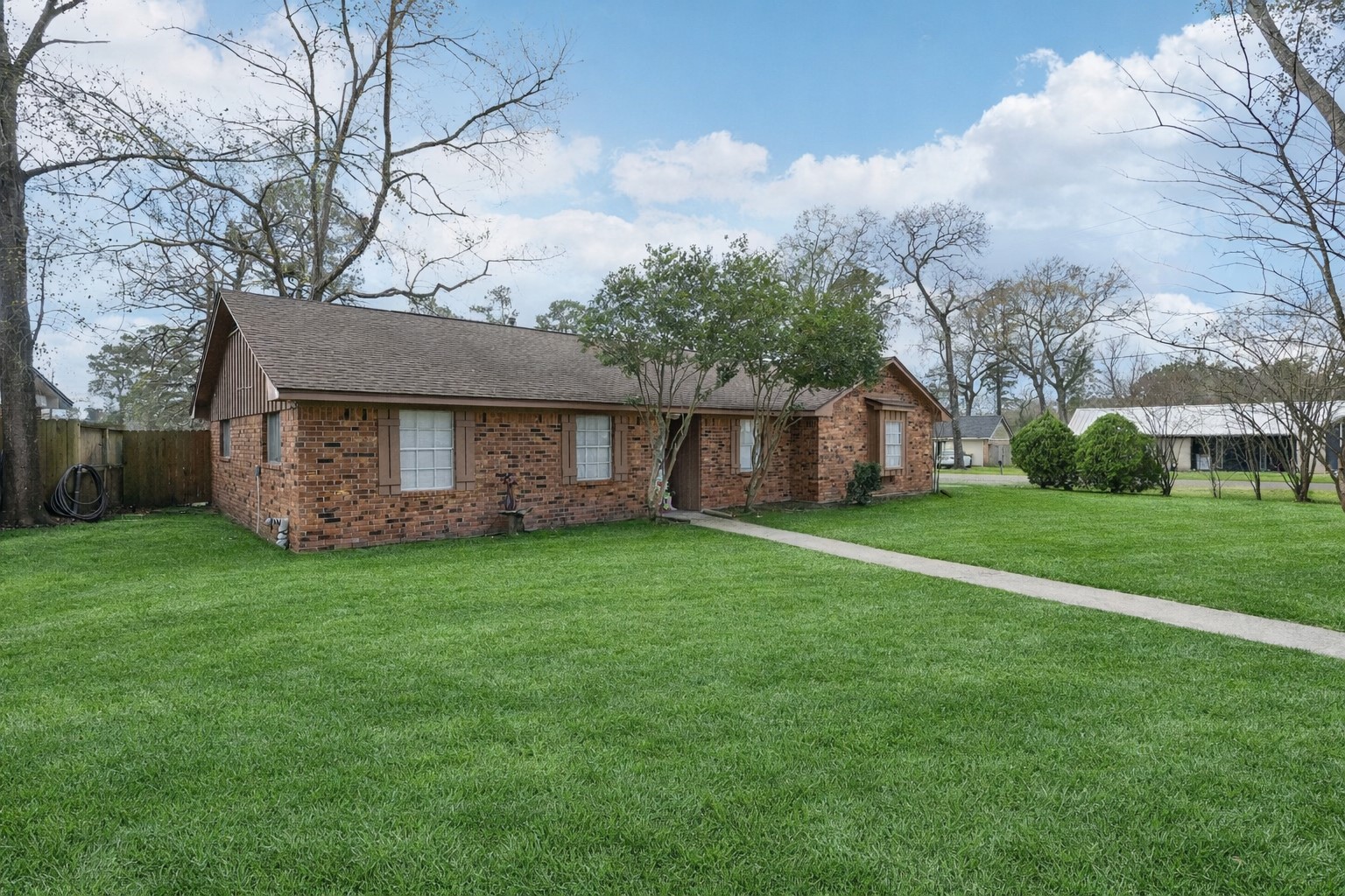 100 Montrose Circle Conroe, TX 77301 - Photo 2 of 27 Grass has been digitally enhanced to show potential