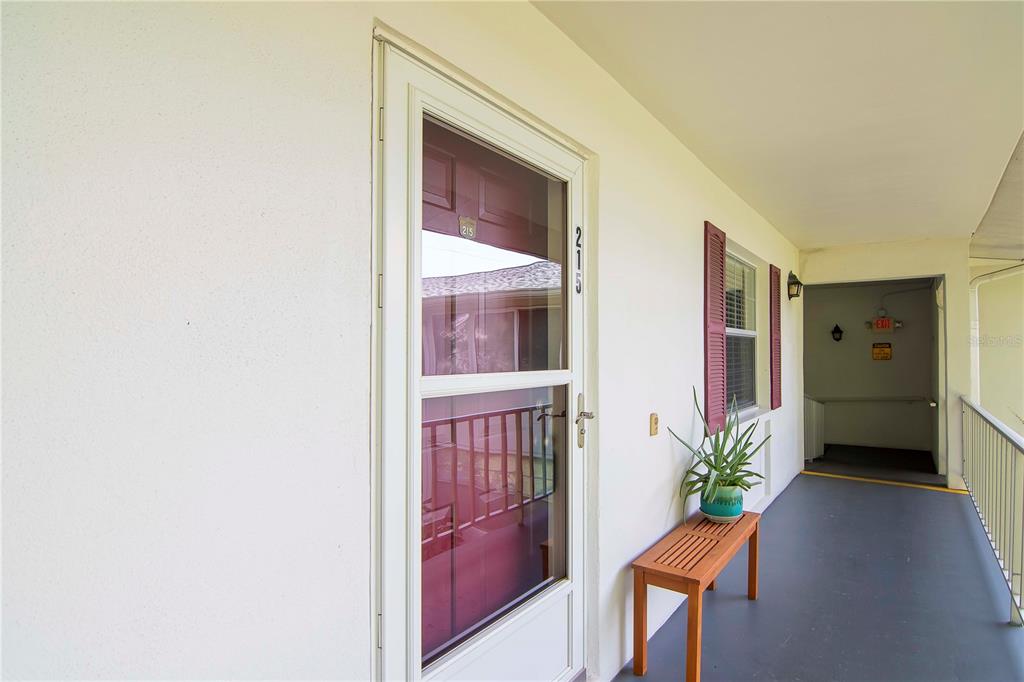 a view of a entryway door and an outdoor space